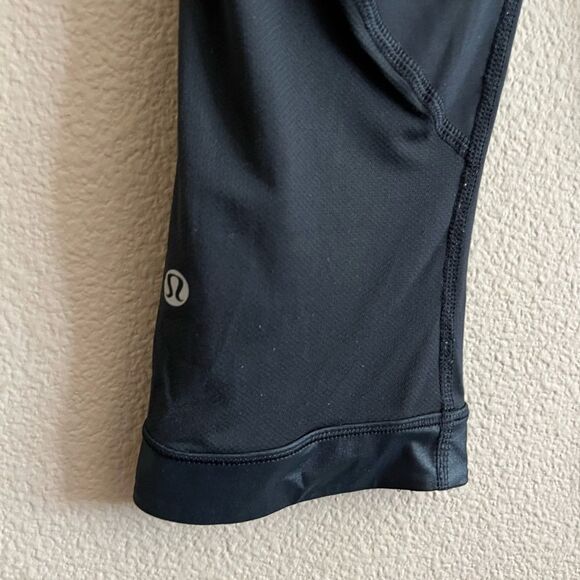 lululemon athletica Capris Leggings Black with Pink Floral Waistband - Picture 6 of 8